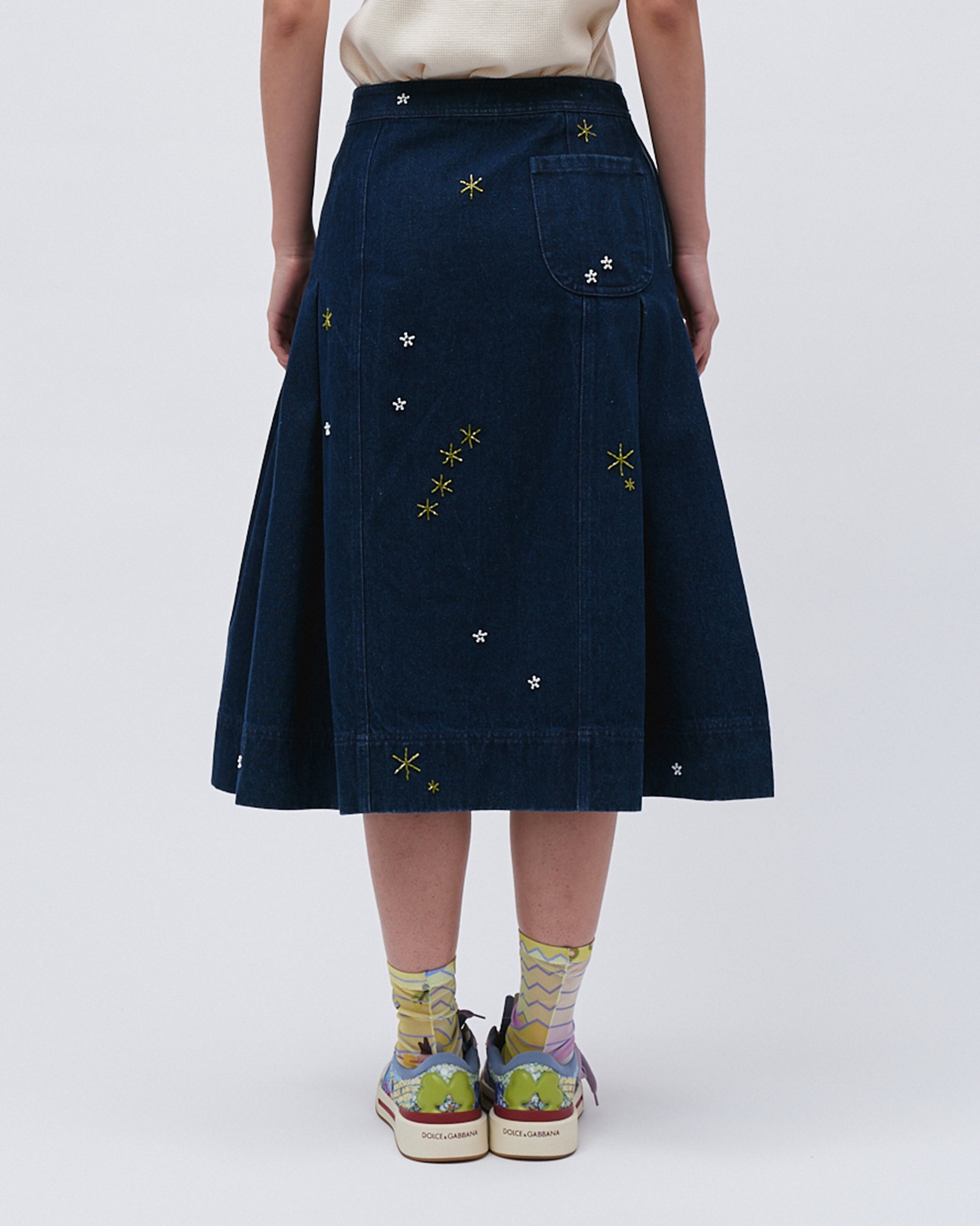 WOMEN'S DENIM NAVY COLOUR MIDI LENGTH SKIRT WITH STAR EMBROIDERIES AND SIDE PLEATS
