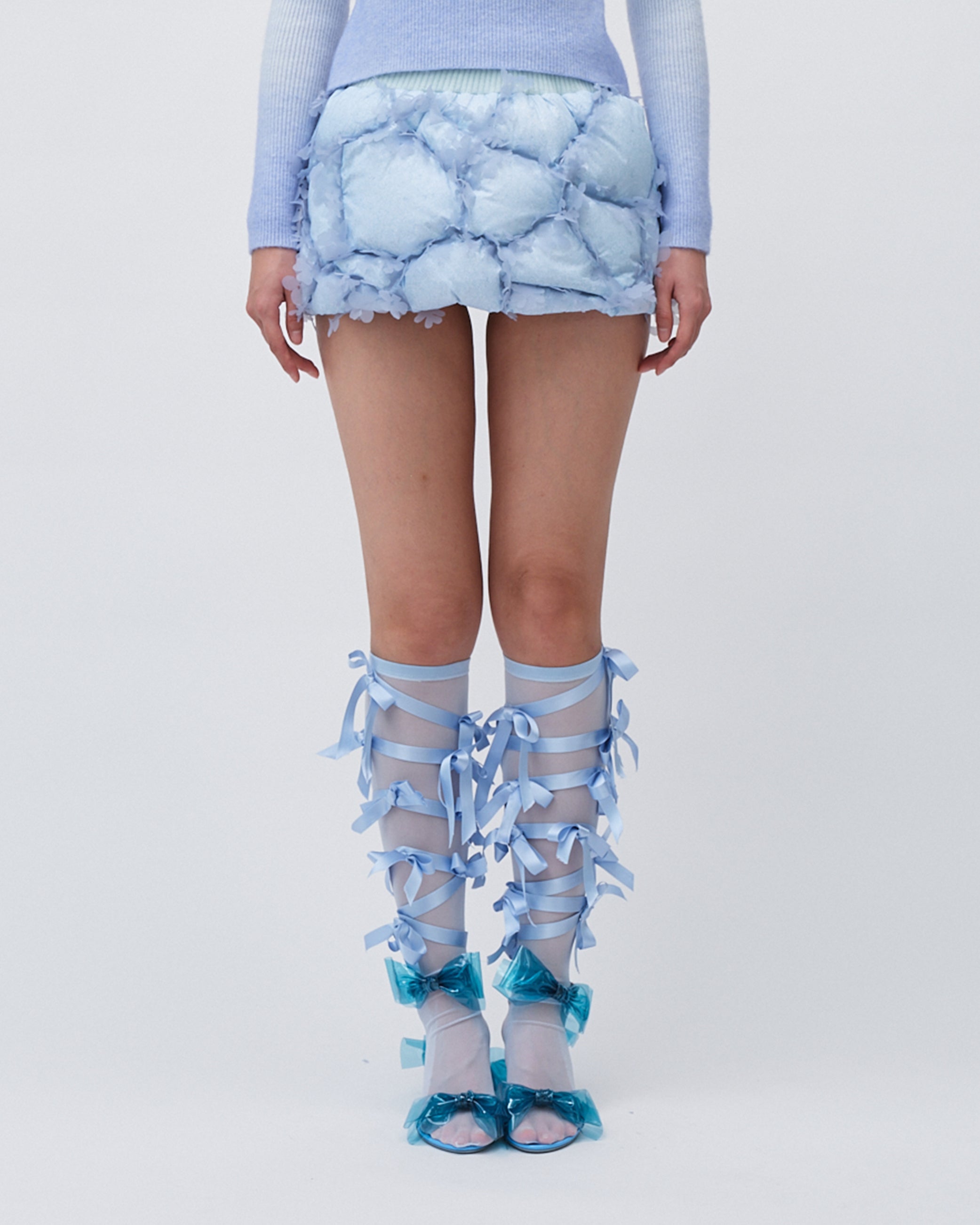 WOMENS MINI SKIRT QUILTED PUFFER SKIRT WITH LASER CUT FLOWERS AND ELASTIC WAISTBAND BLUE