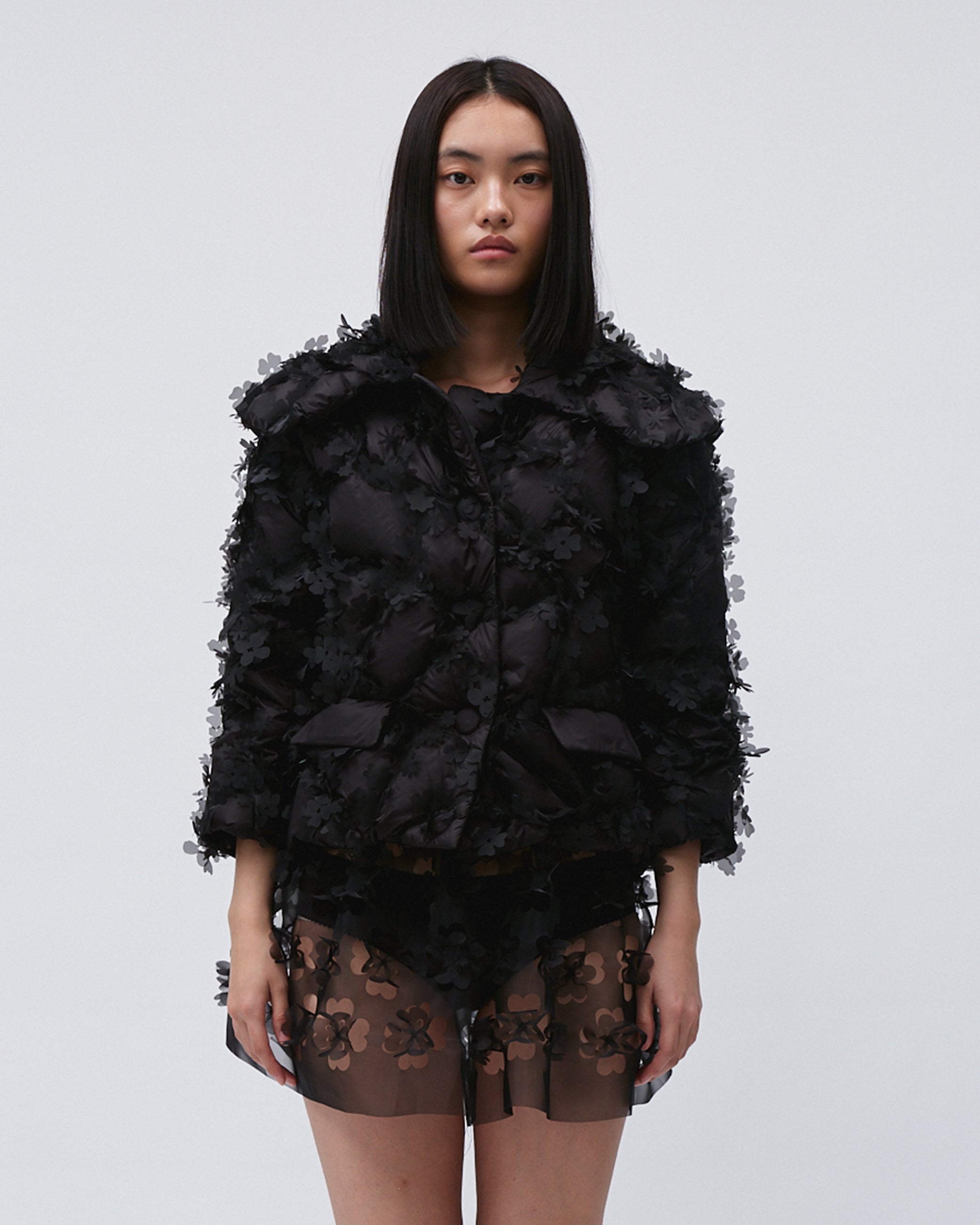 WOMEN'S QUILTED LASER CUT PUFFER JACKET WITH POCKETS LONG SLEEVE BLACK COAT