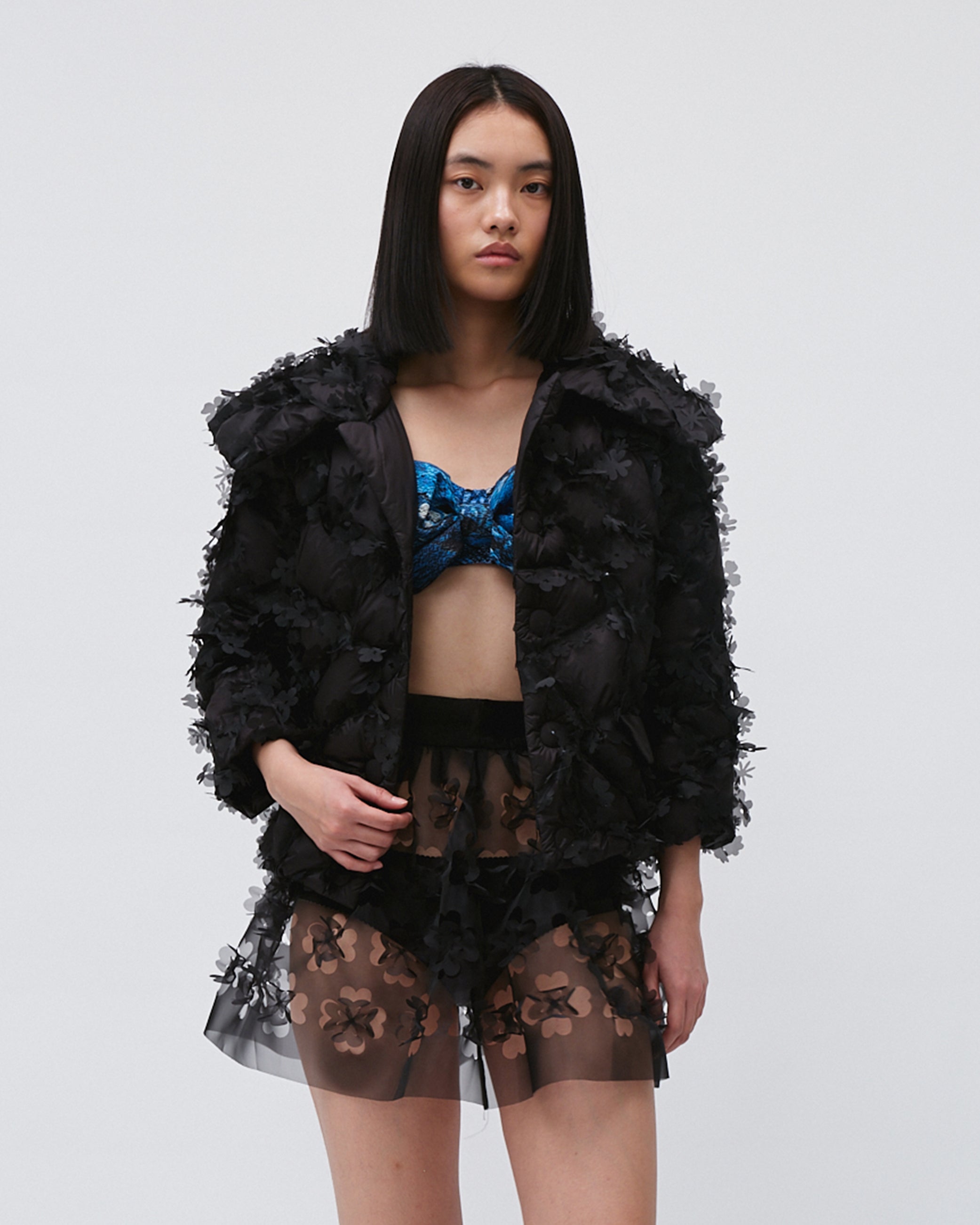 WOMEN'S QUILTED LASER CUT PUFFER JACKET WITH POCKETS LONG SLEEVE BLACK COAT