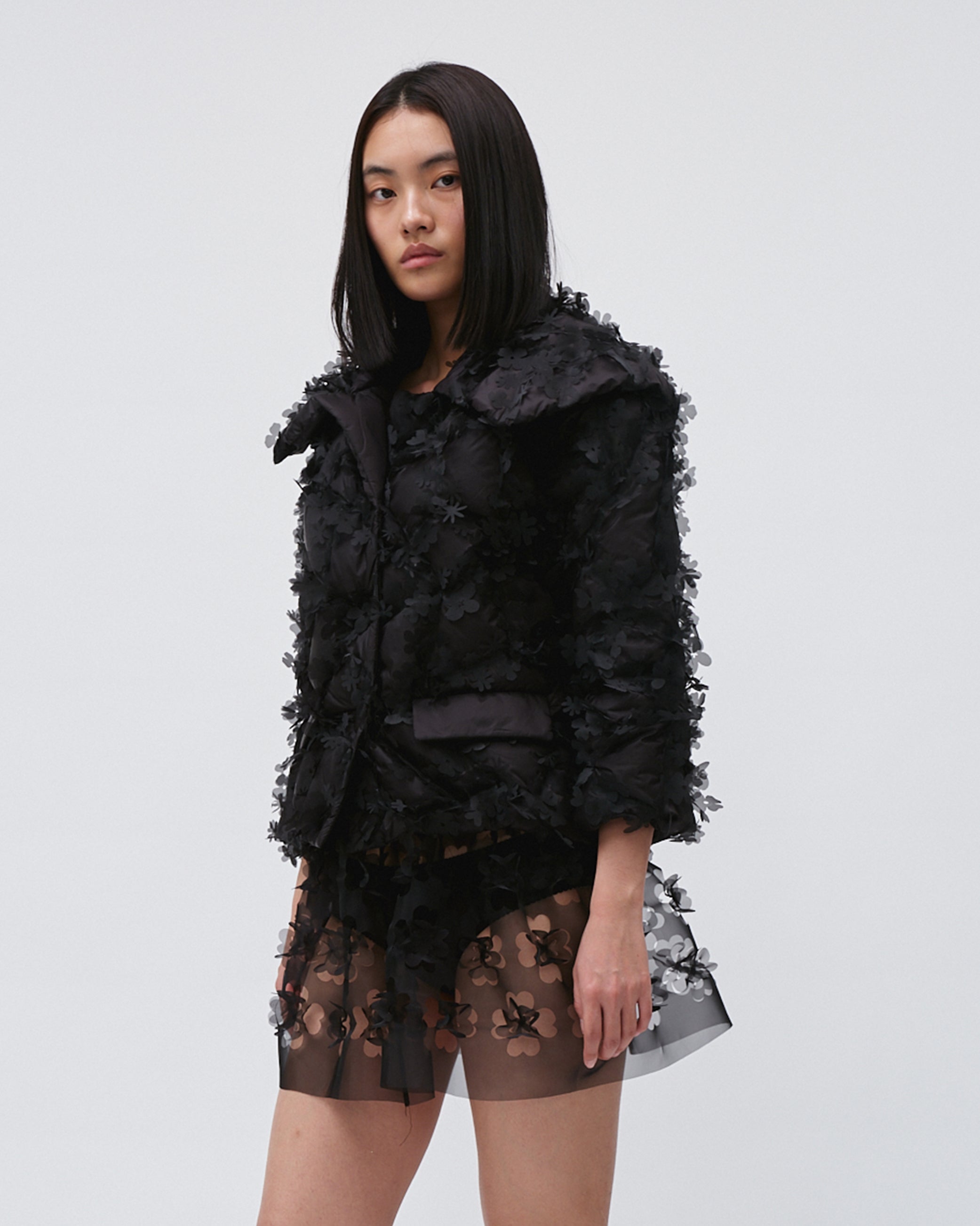 WOMEN'S QUILTED LASER CUT PUFFER JACKET WITH POCKETS LONG SLEEVE BLACK COAT